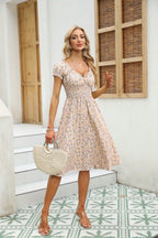 Vrouwelijke bloemen midi jurk - luchtige smock jurk voor zomerse gelegenheden