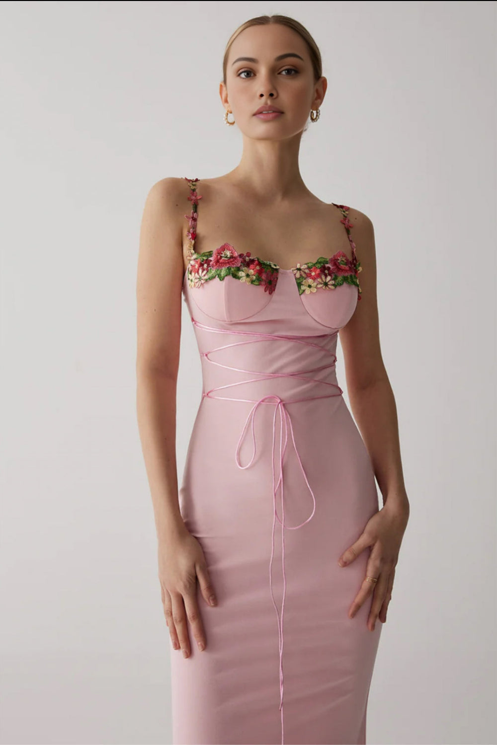 Dames feestjurk - lichtroze met bloemenaccenten, mouwloos avondkleding