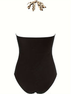 Dames zwarte luipaardprint badpak - criss-cross halternek stijl