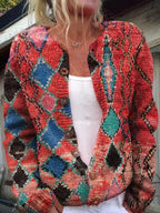 Gebloemde cardigan - gebreide damestrui met knoopdetails - Bakkermode.nl