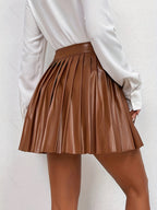 Dames geplooide rok - elegante a-lijn in donkerbruin - casual faux leren minirok voor veelzijdige outfits