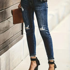 Diepblauwe distressed skinny jeans - trendy dames denimbroek