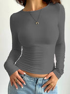 Langsleeve getailleerde dames top - stijlvolle stretch top