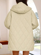 Gewatteerde puffer zwarte en beige winterjas voor dames - warm en oversized - Bakkermode.nl