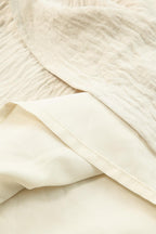 Maxi jurk - elegante beige damesjurk met ceintuur