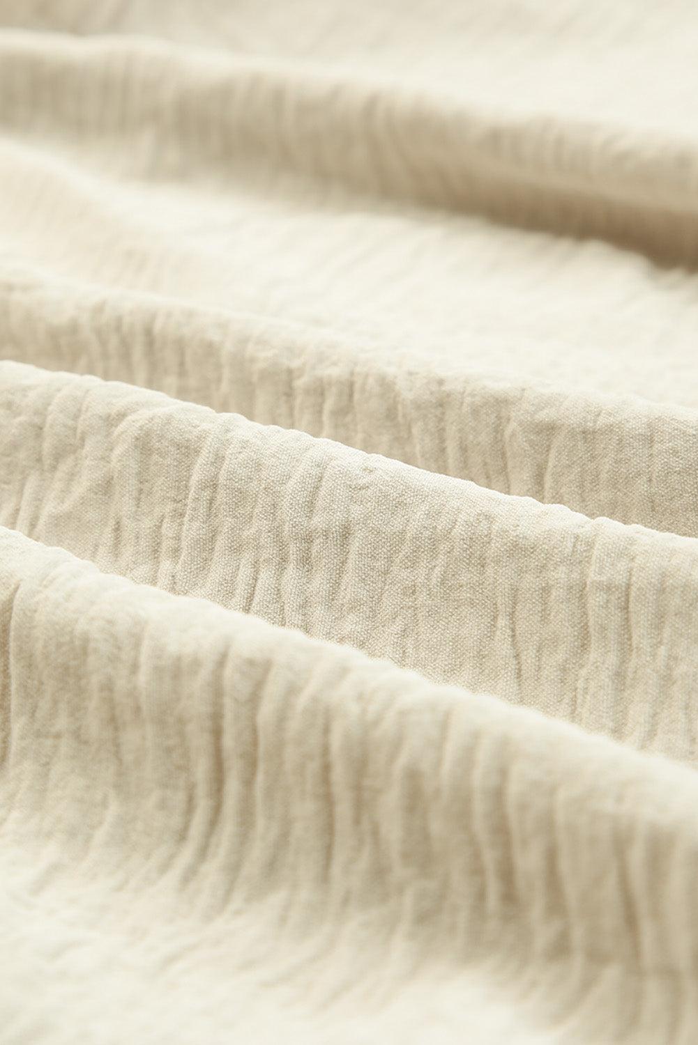 Maxi jurk - elegante beige damesjurk met ceintuur