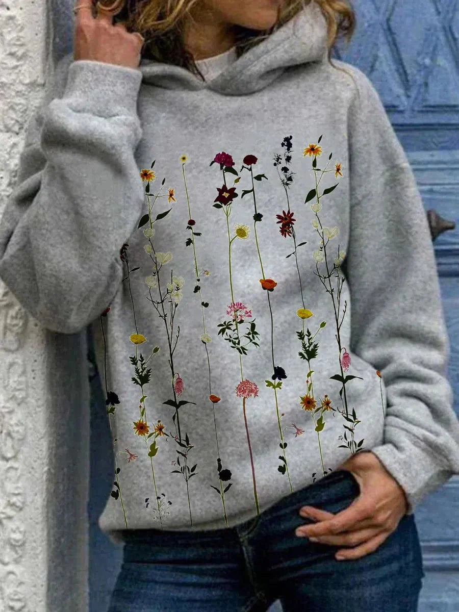 Bloemenprint hoodie - dames grijze sweatshirt met levendig bloemenmotief