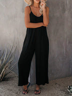 Wide leg jumpsuit - elegante zwarte dames romper met spaghettibandjes