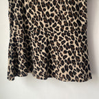 Elegante luipaardprint peplum blouse - Bakkermode.nl