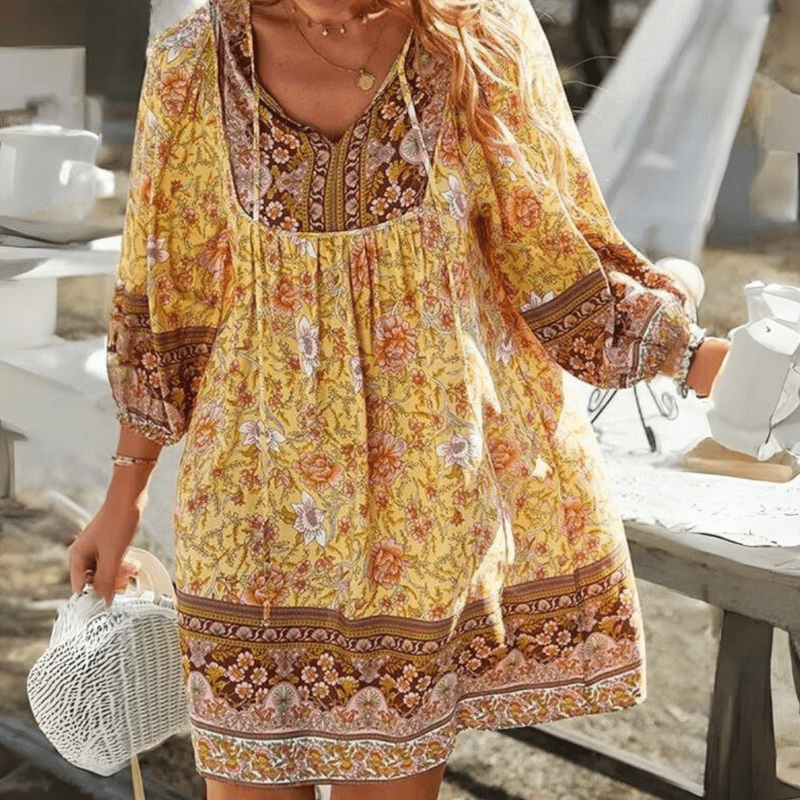 Dames boho mini jurk met v-hals en pofmouwen - relaxed en elegant zomeroutfit