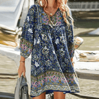 Dames boho mini jurk met v-hals en pofmouwen - relaxed en elegant zomeroutfit