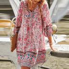 Dames boho mini jurk met v-hals en pofmouwen - relaxed en elegant zomeroutfit