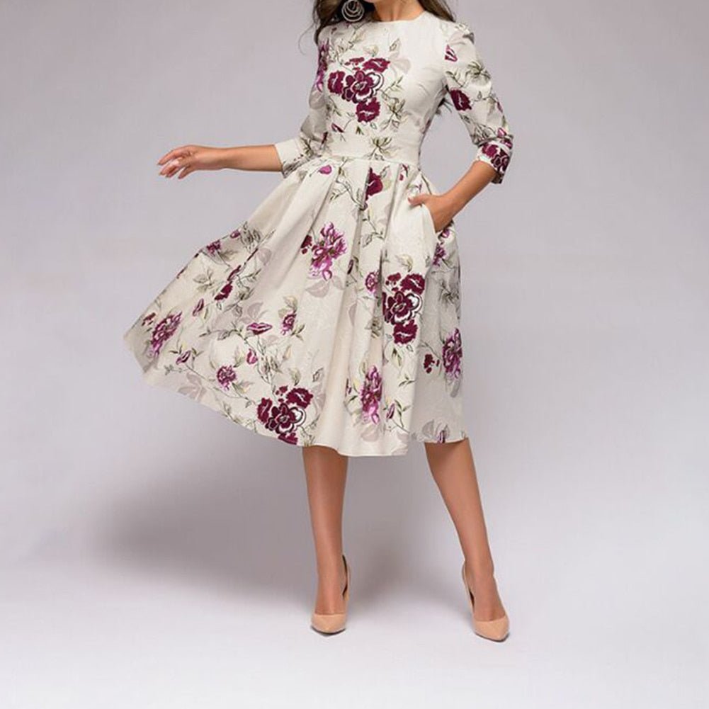 Florale midi jurk - elegante damesjurk met zakken