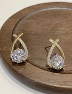 Sprankelende kristallen - gouden elegante damesoorbellen - Bakkermode.nl