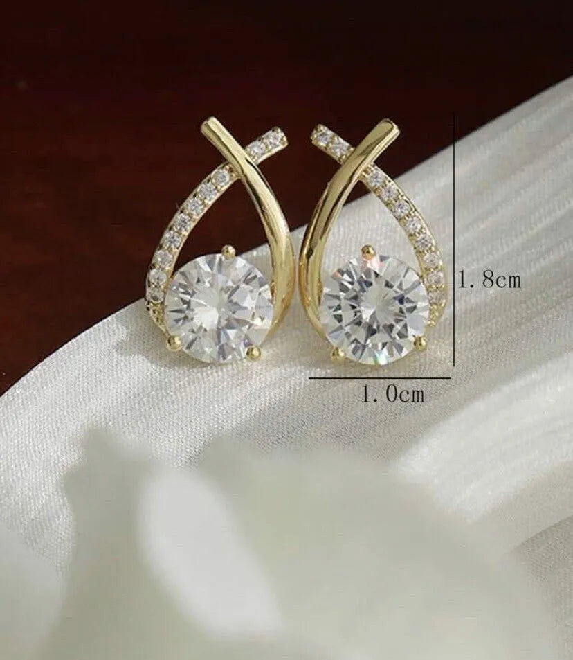 Sprankelende kristallen - gouden elegante damesoorbellen - Bakkermode.nl