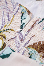 Midi jurk - kleurrijke bloemenprint met spaghettibandjes