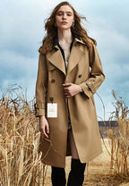 Trenchcoat met dubbele knopenrij voor dames - lange jas met ceintuur - Bakkermode.nl