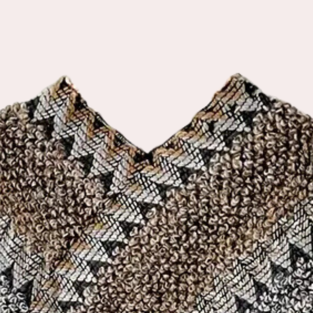 Gebreide poncho - stijlvolle dameswrap met franjes